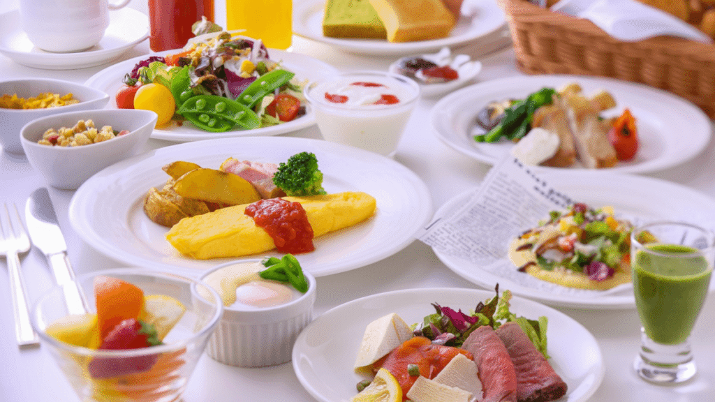 Delicious breakfast buffet spread at Hotel Nikko Nara featuring fresh vegetables, omelets, and Japanese dishes. Healthy and family-friendly dining options for parents and kids.