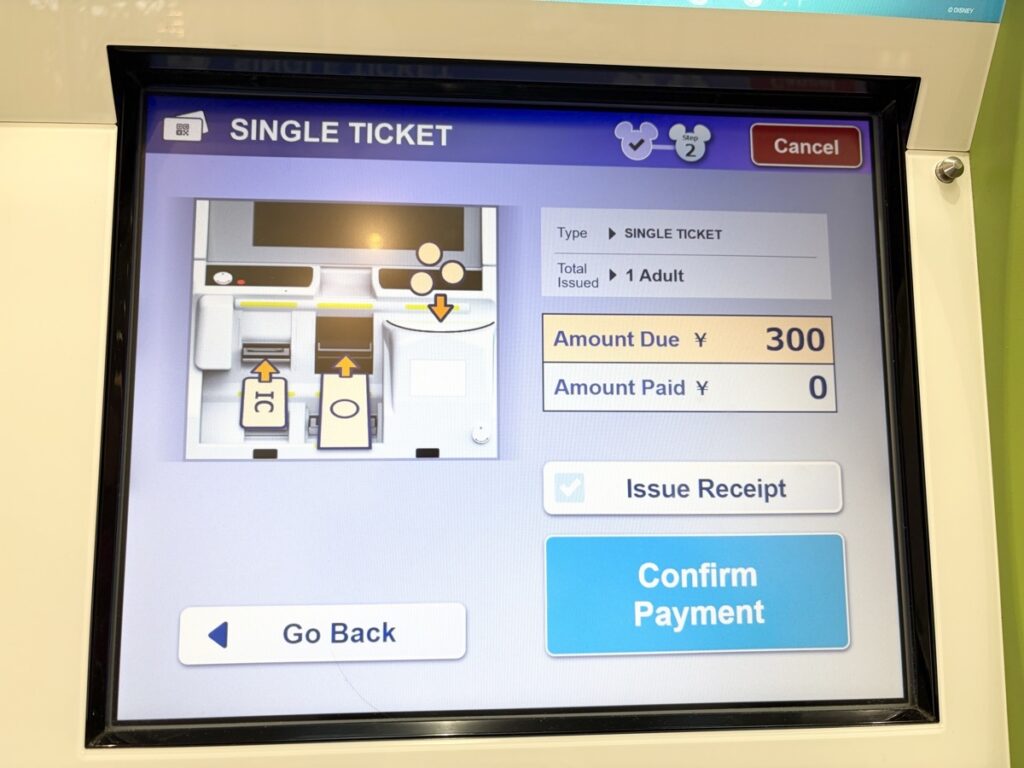 Disney Resort Line ticket machine English payment confirmation screen — tap to complete purchase
