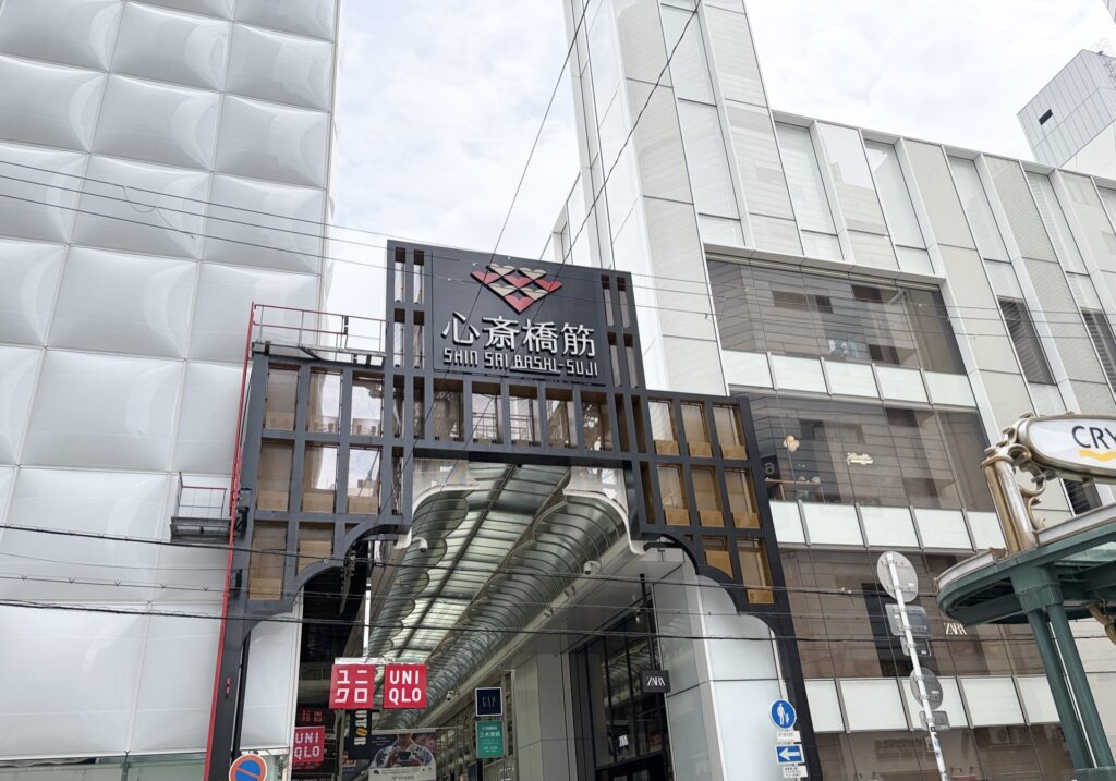 Shinsaibashi shopping arcade in Osaka — covered street leading toward Daimaru department store