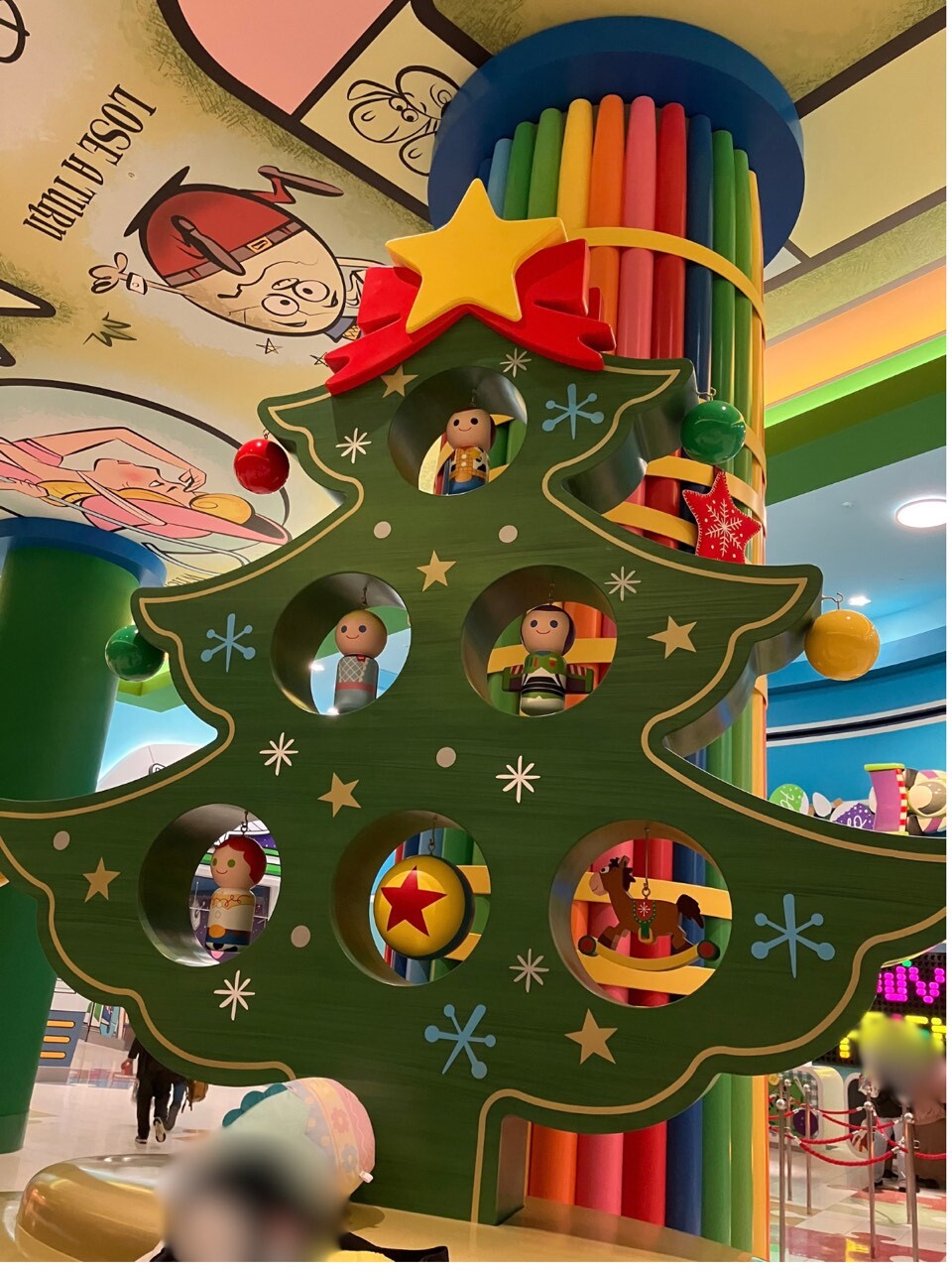 Wooden Toy Story Christmas tree with Woody and Buzz ornaments in the Toy Story Hotel lobby, Tokyo Disney Resort